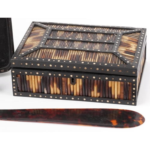 1131 - Porcupine and ebony quill box, tortoiseshell letter opener and an inlaid mother of pearl Chinese lac... 