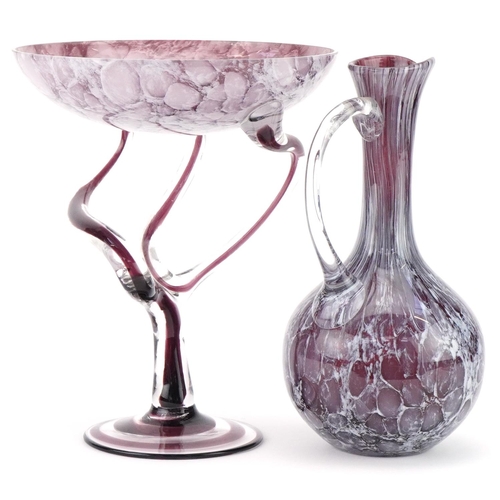 1176 - 20th century purple art glass tazza together with a similar art glass jug, the largest 27cm high