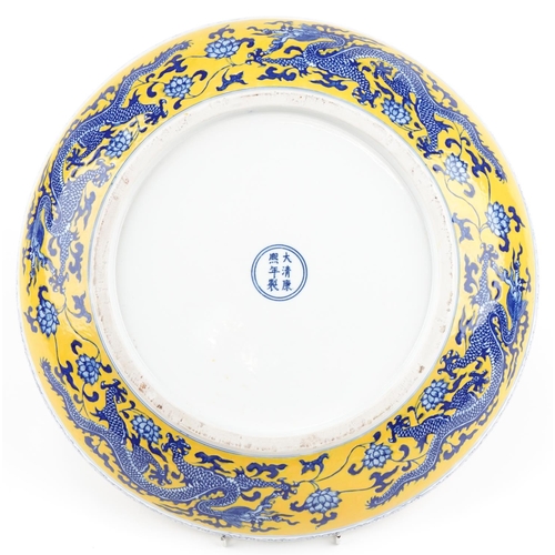 419 - Large Chinese porcelain dragon bowl, character mark to the reverse, 40cms in diameter