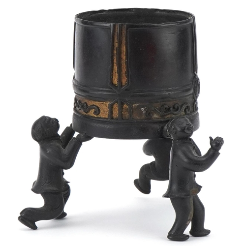 434 - Chinese bronze incense burner supported by three playful boys, 15cm high