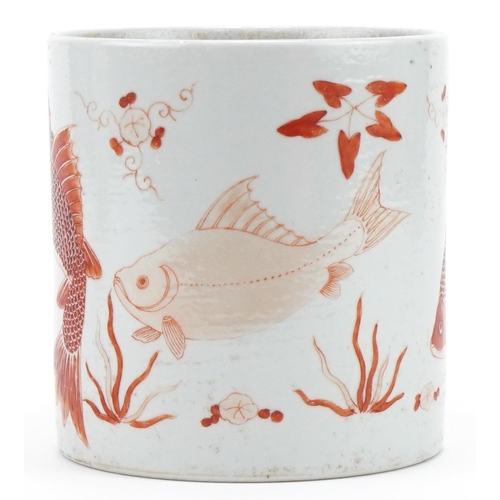 430 - Chinese porcelain brush pot hand painted in iron red with fish, 12cm high