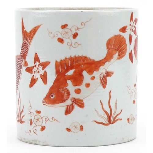 430 - Chinese porcelain brush pot hand painted in iron red with fish, 12cm high