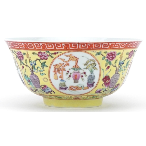 70 - Chinese porcelain yellow ground bowl decorated with panels of precious objects, character mark to th... 