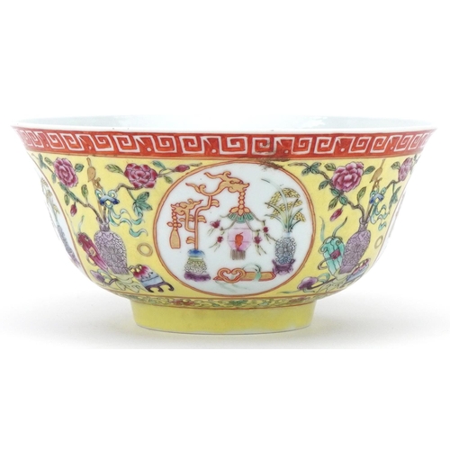 70 - Chinese porcelain yellow ground bowl decorated with panels of precious objects, character mark to th... 