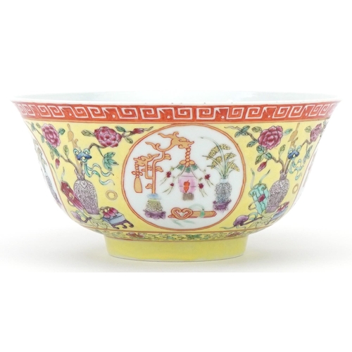 70 - Chinese porcelain yellow ground bowl decorated with panels of precious objects, character mark to th... 