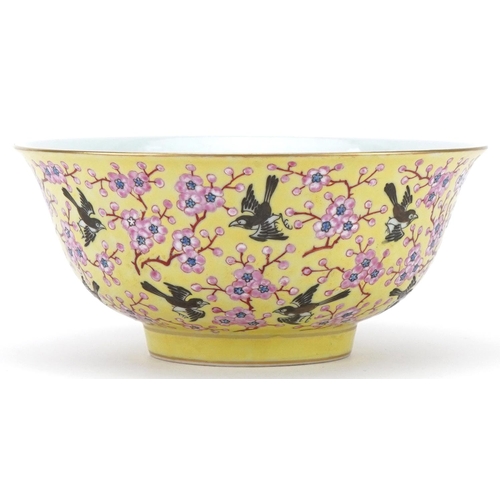 351 - Chinese porcelain yellow ground bowl decorated with flowers and birds, character mark to the base, 1... 