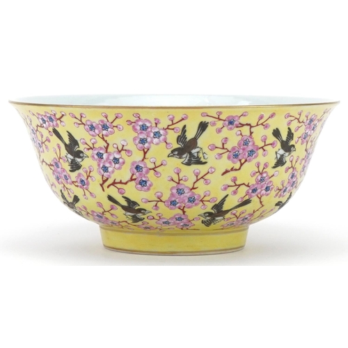 351 - Chinese porcelain yellow ground bowl decorated with flowers and birds, character mark to the base, 1... 