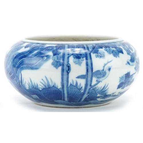 283 - Chinese porcelain blue and white bowl decorated with birds in a landscape, character mark to the bas... 