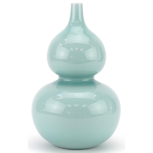 276 - Chinese celadon glazed porcelain onion shaped vase, blue character mark to the base, 28cm high