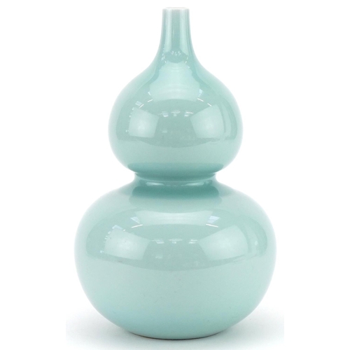 276 - Chinese celadon glazed porcelain onion shaped vase, blue character mark to the base, 28cm high