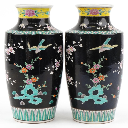 345 - Large pair of Chinese porcelain black enamelled vases decorated with birds of paradise and flowers, ... 