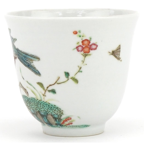 425 - Chinese porcelain tea bowl and saucer hand painted with birds and insects, character mark to the bas... 