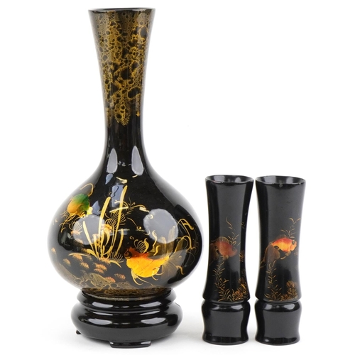 1124 - Chinese black lacquered vase and two spill vases hand painted with fish and aquatic life, the larges... 