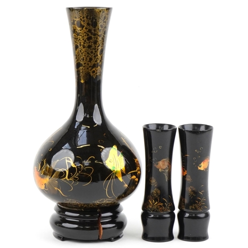 1124 - Chinese black lacquered vase and two spill vases hand painted with fish and aquatic life, the larges... 