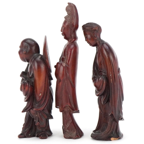 81 - Three Chinese carved wood figures including a Buddha, the largest 14cm high