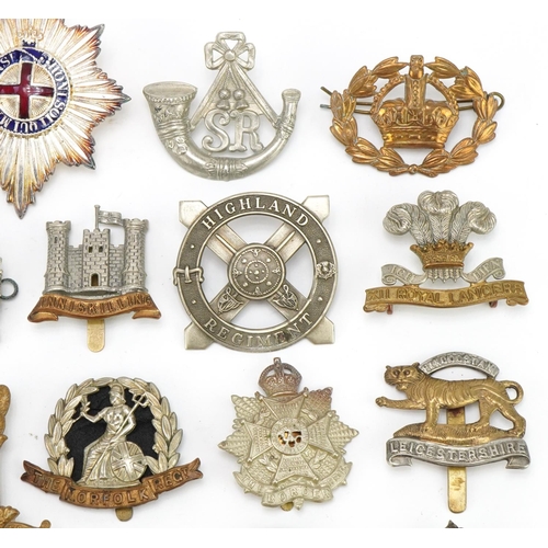 1520 - Approximately forty cap badges to include Highland Regiment, Scottish King's Borderers, The Royal Sc... 