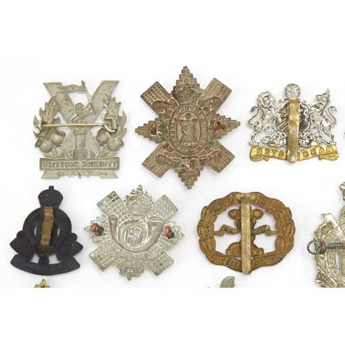 1520 - Approximately forty cap badges to include Highland Regiment, Scottish King's Borderers, The Royal Sc... 