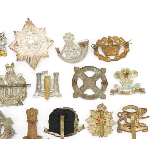 1520 - Approximately forty cap badges to include Highland Regiment, Scottish King's Borderers, The Royal Sc... 