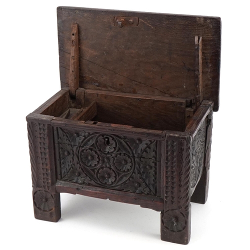 134 - Miniature antique carved oak coffer, possibly a traveller's sample, 20cm H x 30cm W x 16cm D