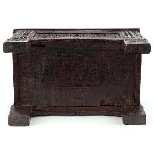 134 - Miniature antique carved oak coffer, possibly a traveller's sample, 20cm H x 30cm W x 16cm D