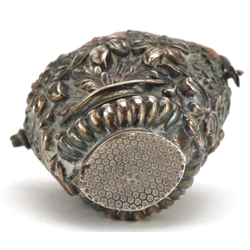 316 - Victorian unmarked silver pin cushion in the form of a basket with swing handle embossed with  flowe... 