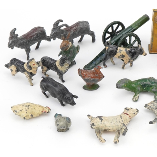 553 - Group of antique hand painted lead farmyard animals and Britains Coconubs