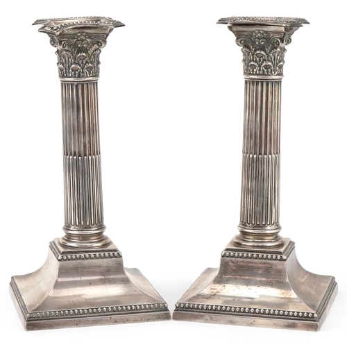 John Round & Son Ltd, pair of Victorian silver Corinthian column candlesticks, Sheffield 1898, each 23cm high, total 1648.0g