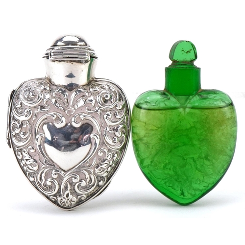 313 - Henry Matthews, Victorian silver scent bottle case in the form of a love heart housing a green glass... 