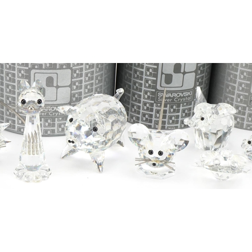 1067 - Collection of Swarovski Crystal animals with boxes including hedgehog, pig, elephant and cat, the la... 