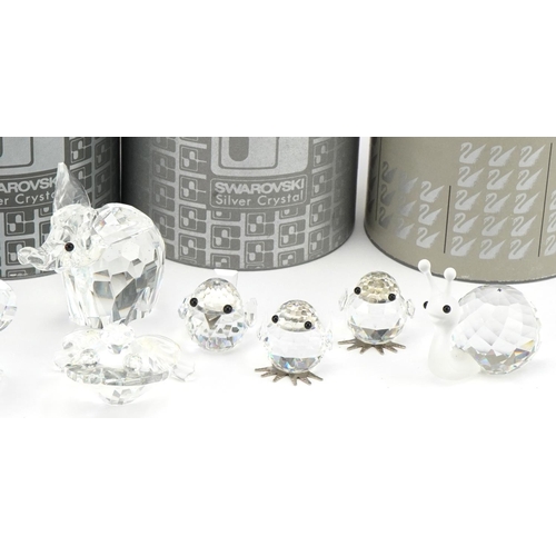 1067 - Collection of Swarovski Crystal animals with boxes including hedgehog, pig, elephant and cat, the la... 