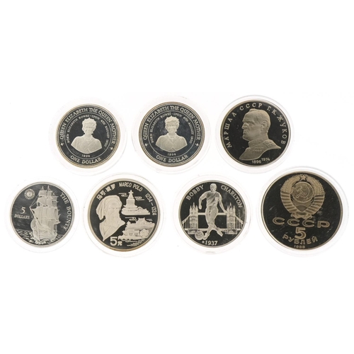 1276 - Five commemorative silver coins and two Russian coins, the silver coins to include Queen Elizabeth T... 