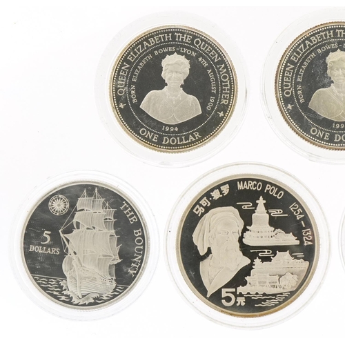 1276 - Five commemorative silver coins and two Russian coins, the silver coins to include Queen Elizabeth T... 