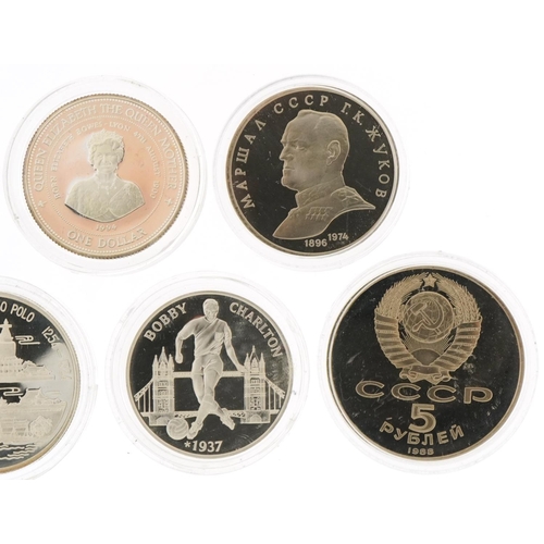 1276 - Five commemorative silver coins and two Russian coins, the silver coins to include Queen Elizabeth T... 