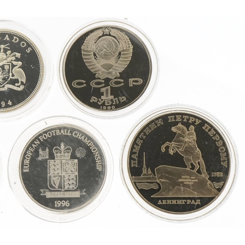 1276 - Five commemorative silver coins and two Russian coins, the silver coins to include Queen Elizabeth T... 