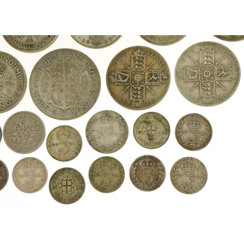 1239 - Pre 1947 silver coinage including florins, sixpences and silver threepenny pieces, 203.3g