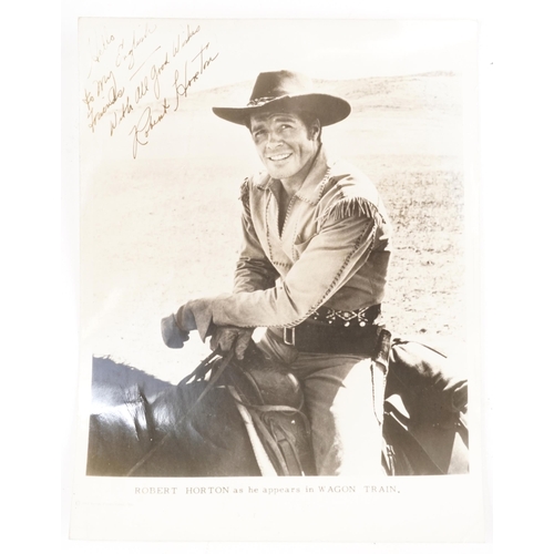 Album of black and white photographs and autographs of American actors and actresses including Robert Horton from Wagon Train, Audie Murphy, Marlon Brando