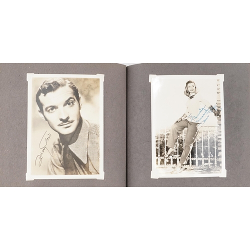 1318 - Album of black and white photographs and autographs of American actors and actresses including Rober... 