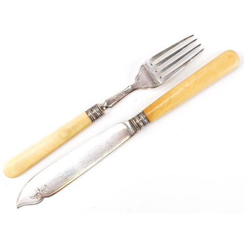 386 - Oak canteen of twelve silver plated fish knives and forks with ivorine handles, the canteen 35cm wid... 