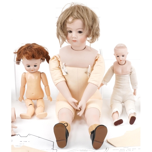 567 - Four antique and later bisque headed dolls including Armand Marseille and Dianna Effner, the largest... 