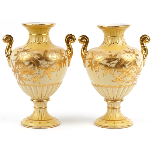 1094 - Pair of Victorian aesthetic twin handled porcelain vases hand gilded with flowers, each 36cm high