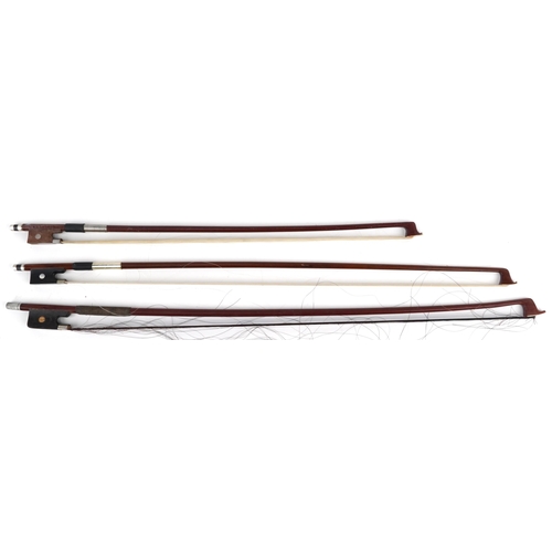 487 - Three old wooden violin bows with mother of pearl inlay, the largest 72cm in length