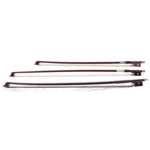 487 - Three old wooden violin bows with mother of pearl inlay, the largest 72cm in length