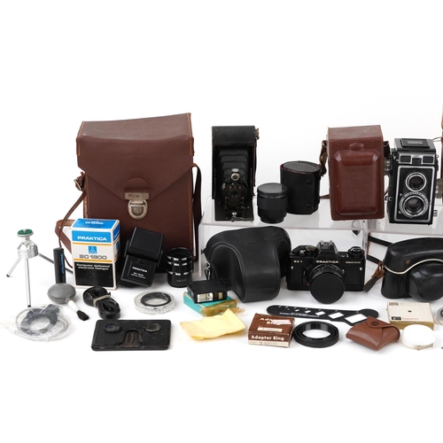 453 - Vintage and later cameras, lenses and accessories including Zeiss Ikon Ikoflex, Praktica BC1 and Pri... 