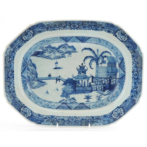 64 - 18th century Chinese porcelain plate hand painted in the Willow pattern, 37cm wide