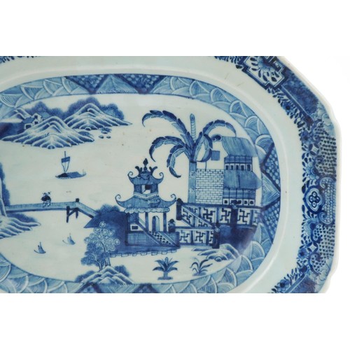 64 - 18th century Chinese porcelain plate hand painted in the Willow pattern, 37cm wide