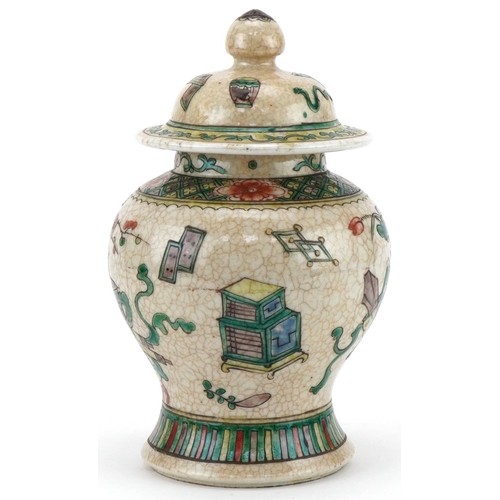 427 - Chinese pottery ginger jar hand painted with a basket of flowers, 22cm high