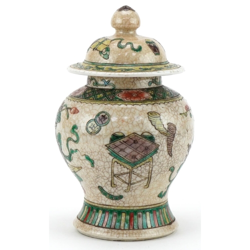 427 - Chinese pottery ginger jar hand painted with a basket of flowers, 22cm high