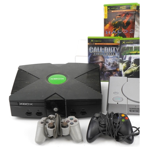 641 - Three games consoles comprising Xbox with controller and a collection of games, PlayStation 2 with c... 