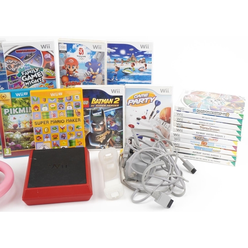 635 - Nintendo Wii Mini games console with controller and a collection of games