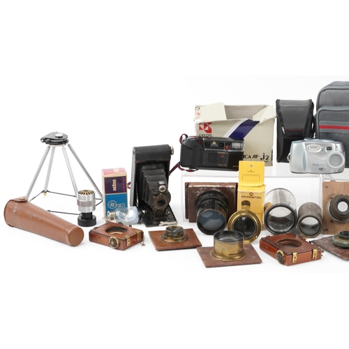 470 - Vintage and later cameras, lenses and accessories including Yashica, Canon and Kodak